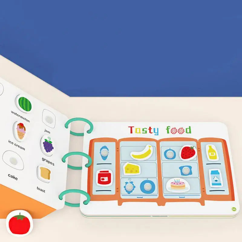 Ring-bound activity book open to illustrated food-matching pages