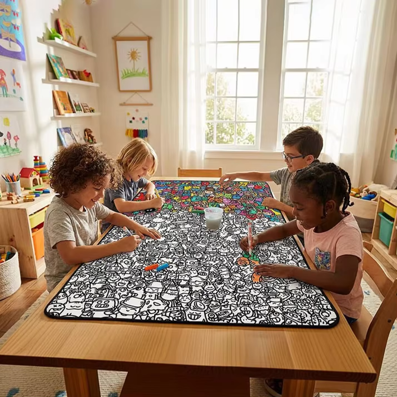 Four children sharing a large doodle coloring mat around a table