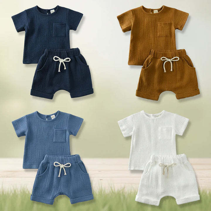 Cotton baby T-shirt and shorts sets in navy blue, brown, blue, and white.