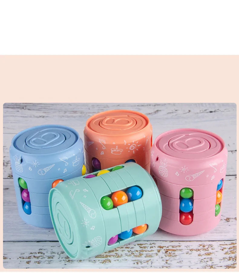 Four fidget puzzles in blue, green, orange, and pink on a wood surface