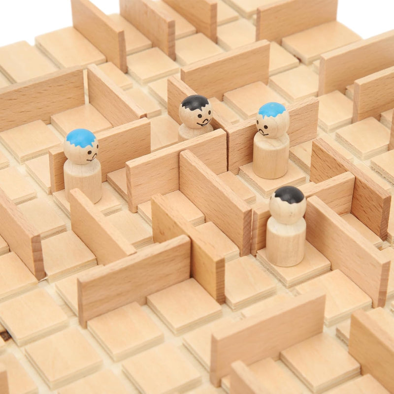 Four wooden pawns surrounded by upright barriers on a wooden strategy board