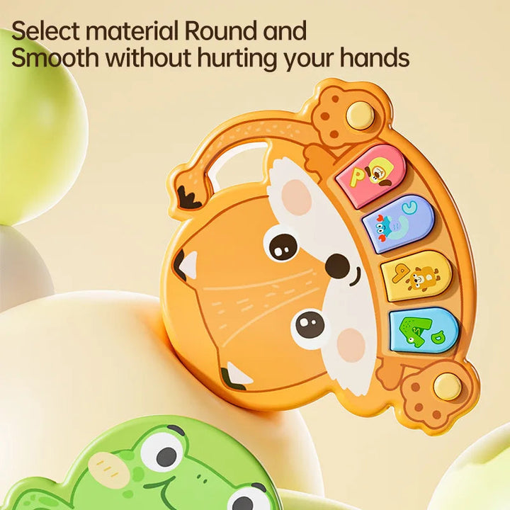 Orange fox animal piano shown above a green frog design