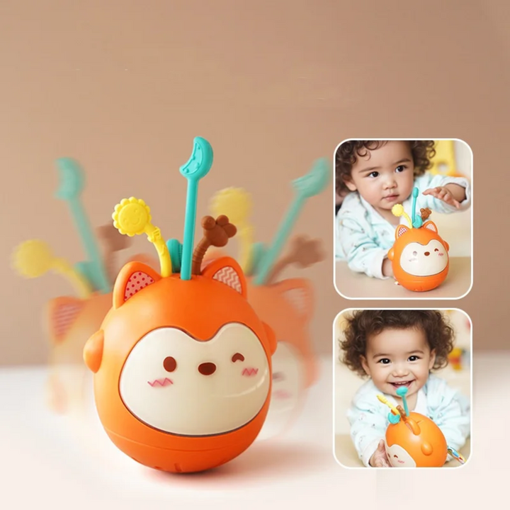 Orange fox musical toy with inset views of a baby holding and exploring its colorful strips.