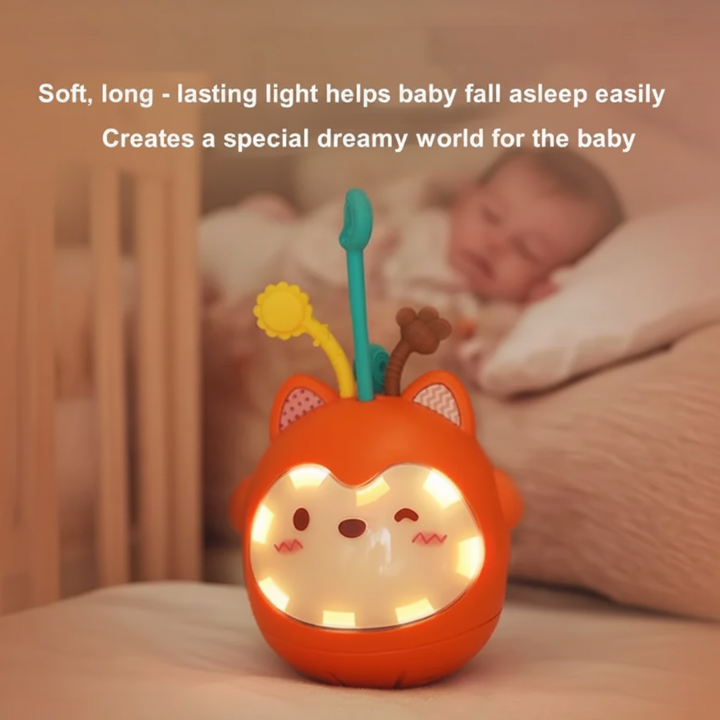 Fox night light glowing warmly beside a sleeping baby.