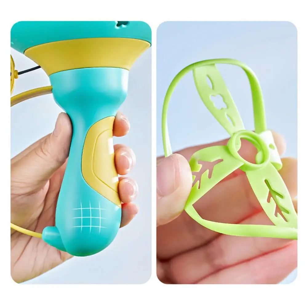 Close-up views of the blue launcher handle and a green disc held in a hand