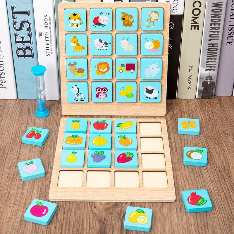 Wooden memory game with fruit and animal picture tiles and a blue sand timer