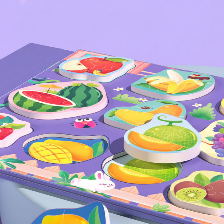 Close-up of colorful fruit puzzle pieces on the open purple matching page.