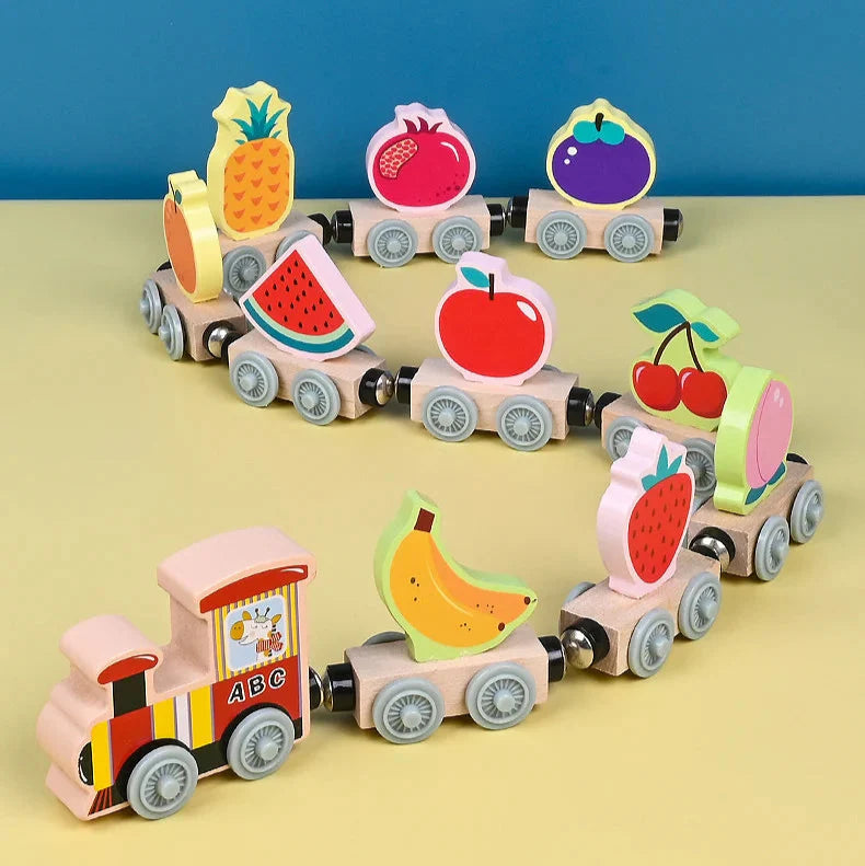 Wooden magnetic fruit train with pineapple, watermelon, banana, and other fruit cars