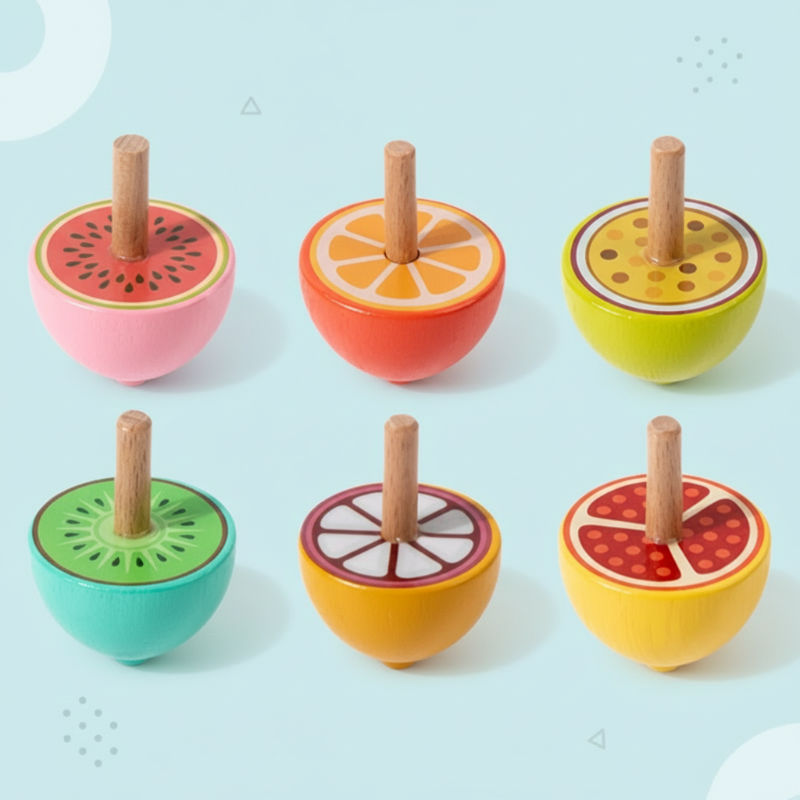 Six colorful fruit spinning tops, including orange, watermelon, and kiwi designs