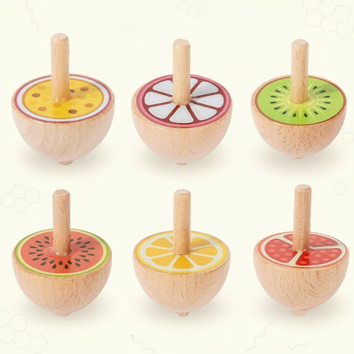 Natural wood spinning tops with colorful fruit-slice patterns