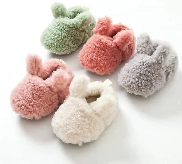 Fuzzy bunny slippers displayed in green, coral, gray, pink, and cream