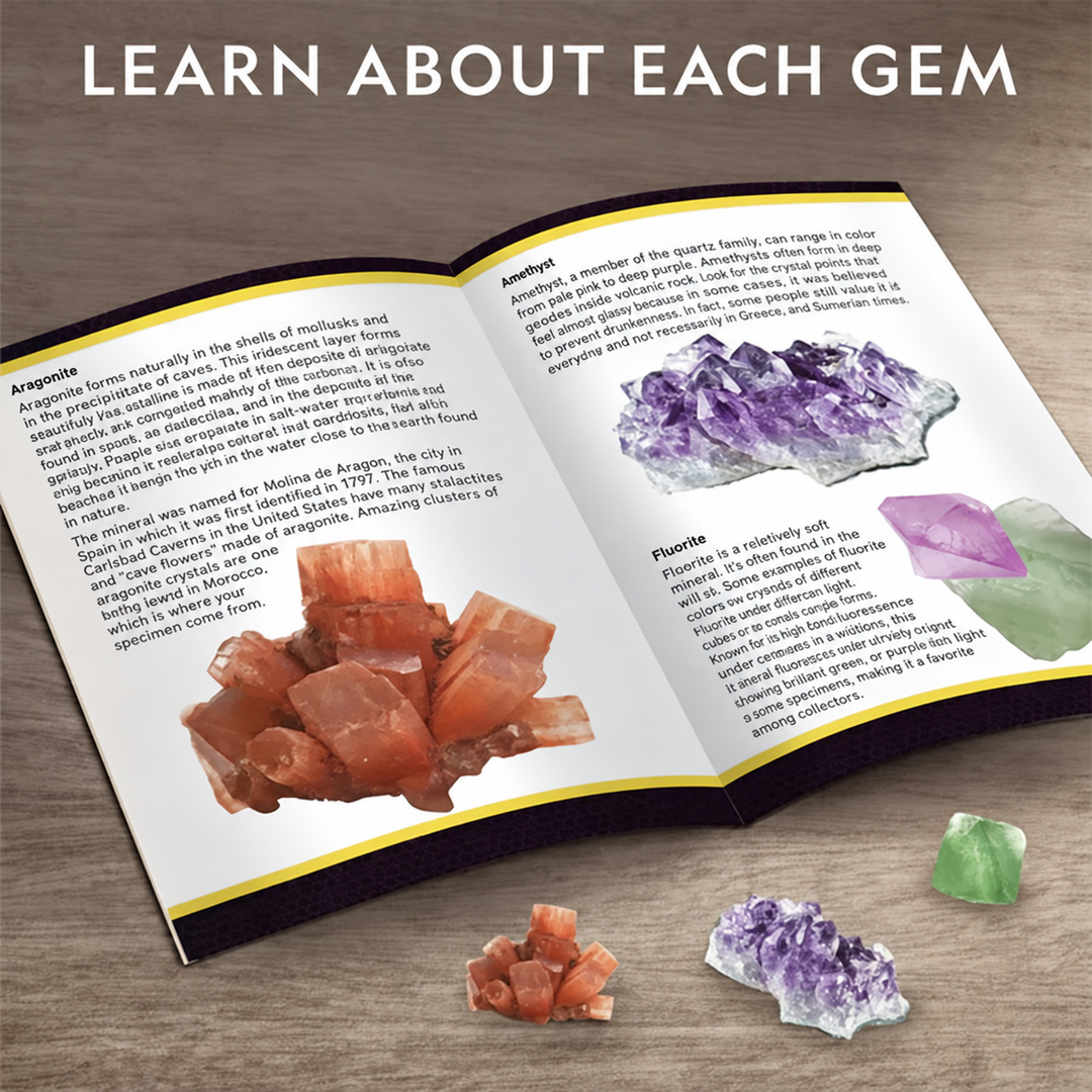 Open gemstone guide with illustrated mineral entries and loose crystals nearby
