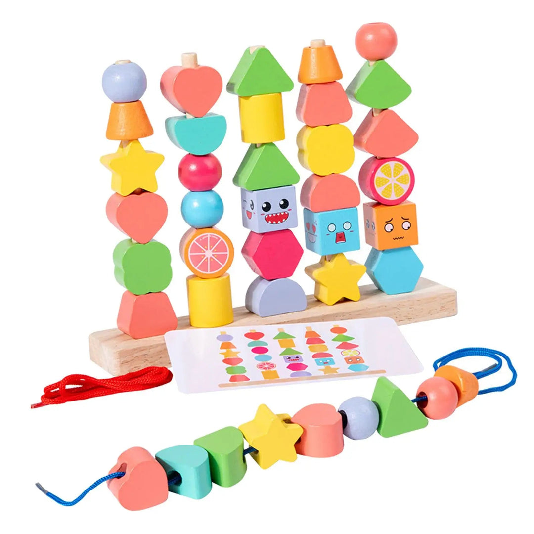 Colorful wooden beads on a stacking stand with a pattern card and a strand of threaded shapes.