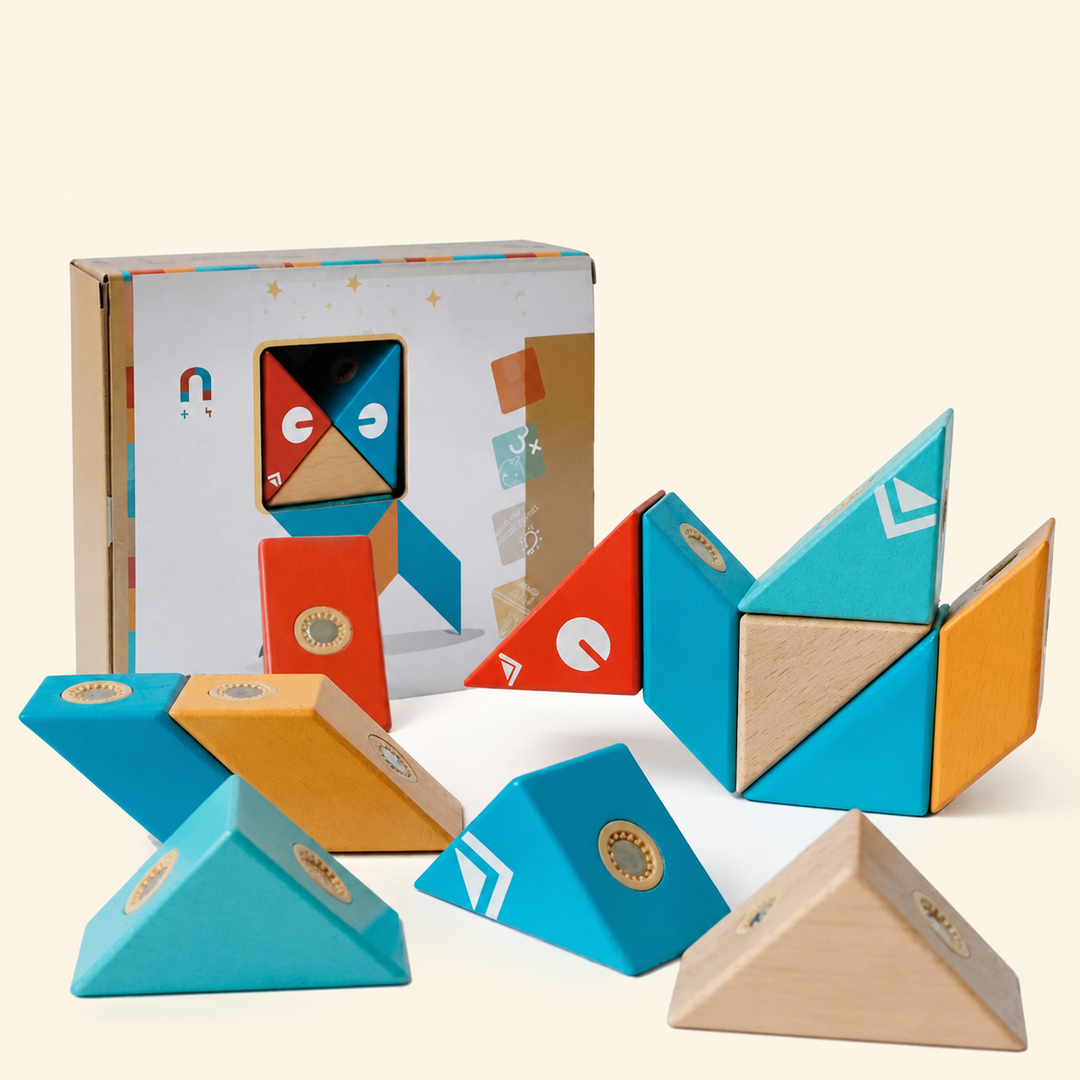 Geometric wooden magnetic blocks in angular arrangements beside their box