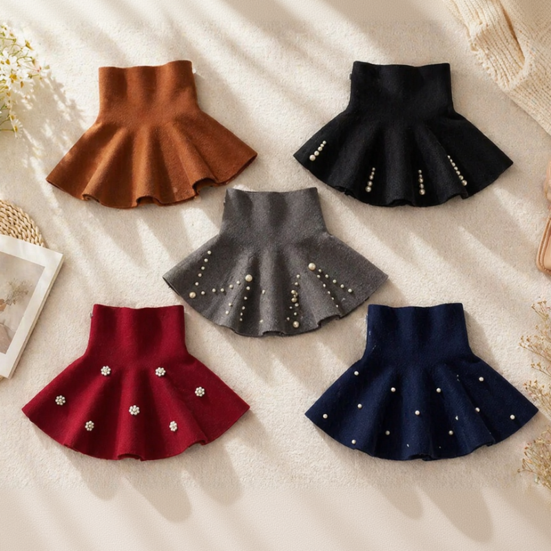 Girls' A-line knit skirts in brown, black, gray, red, and navy with plain and beaded designs