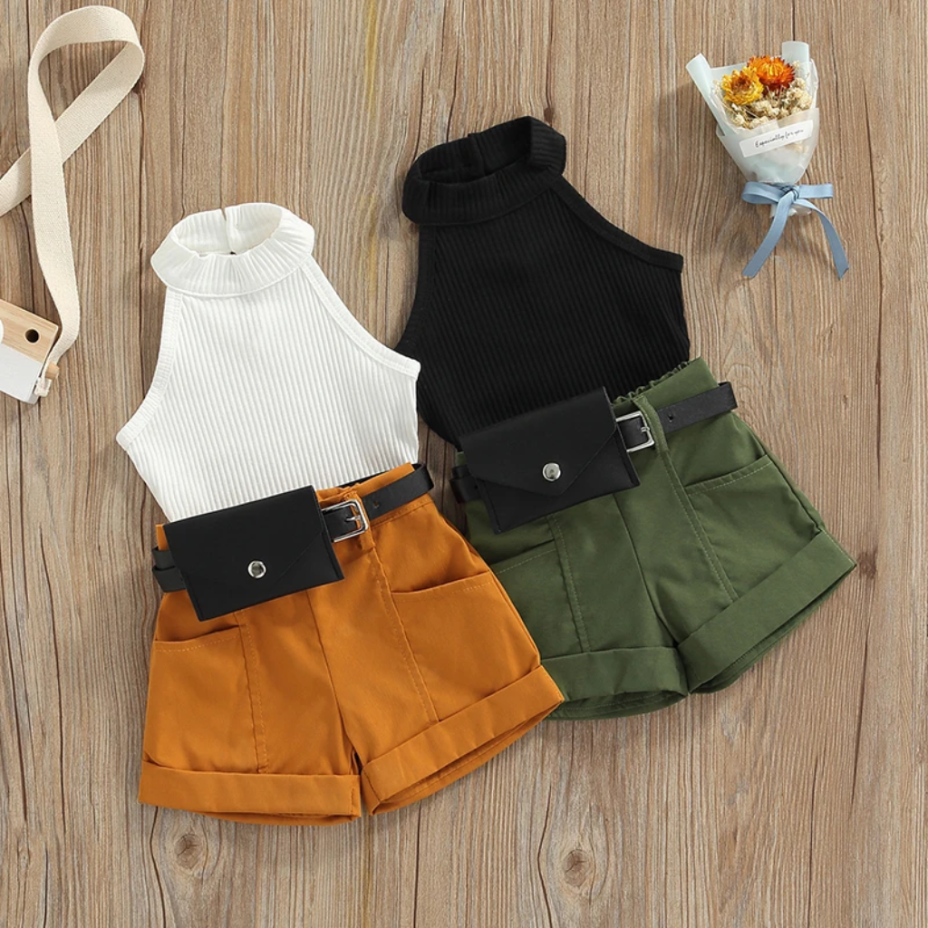 White and black ribbed tops with mustard and olive shorts and black waist bags.