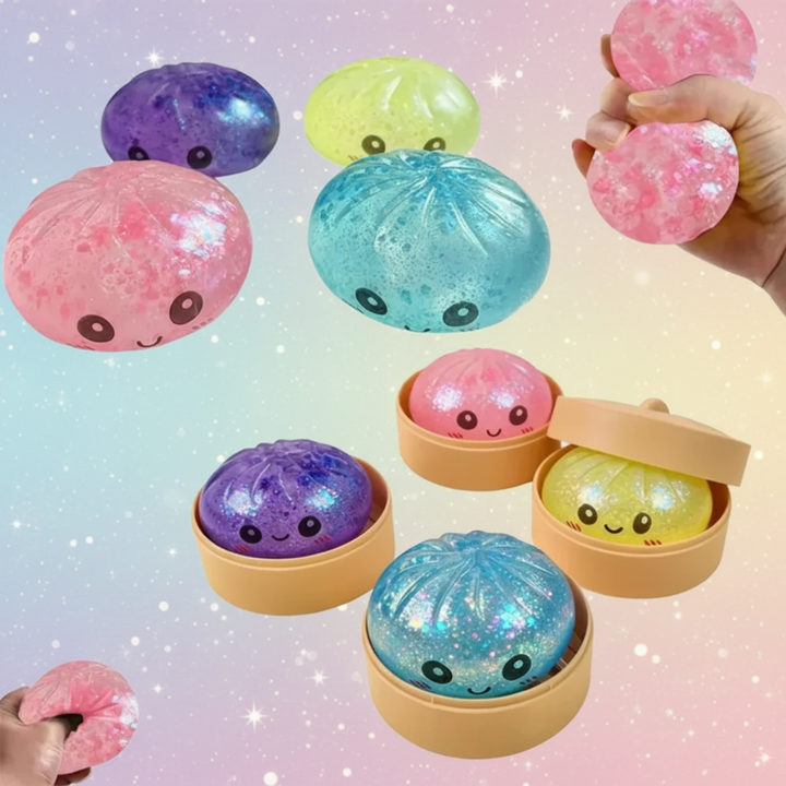 Colorful smiling glitter dumplings with hands squeezing the pink squishy