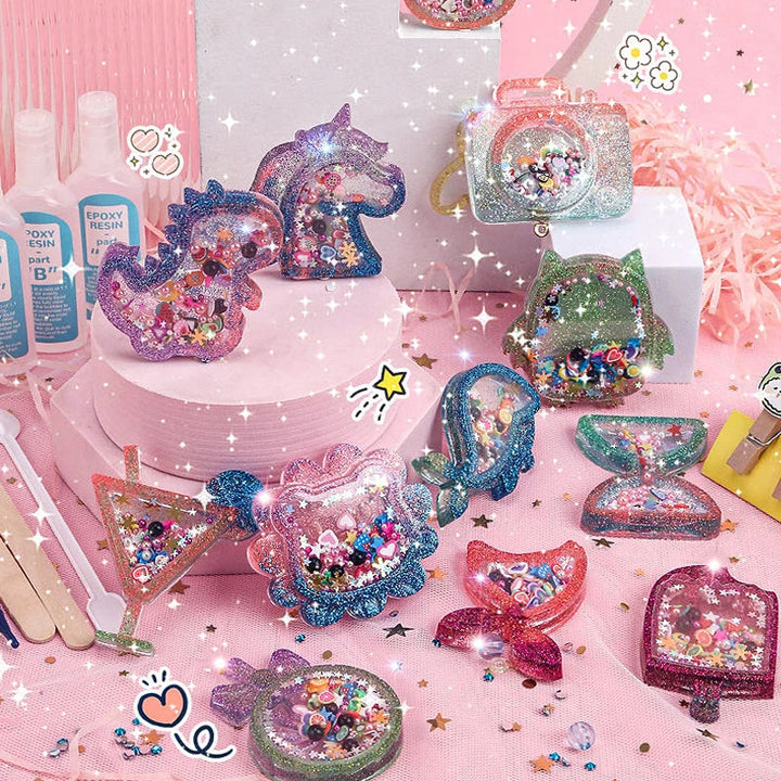 Colorful glitter-filled shaker keychains displayed with resin bottles and mixing sticks on a pink table