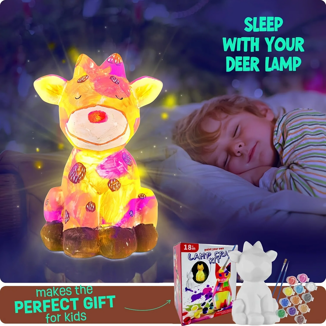 Glowing yellow and pink deer lamp beside a sleeping child, with an unpainted lamp and paints shown below.