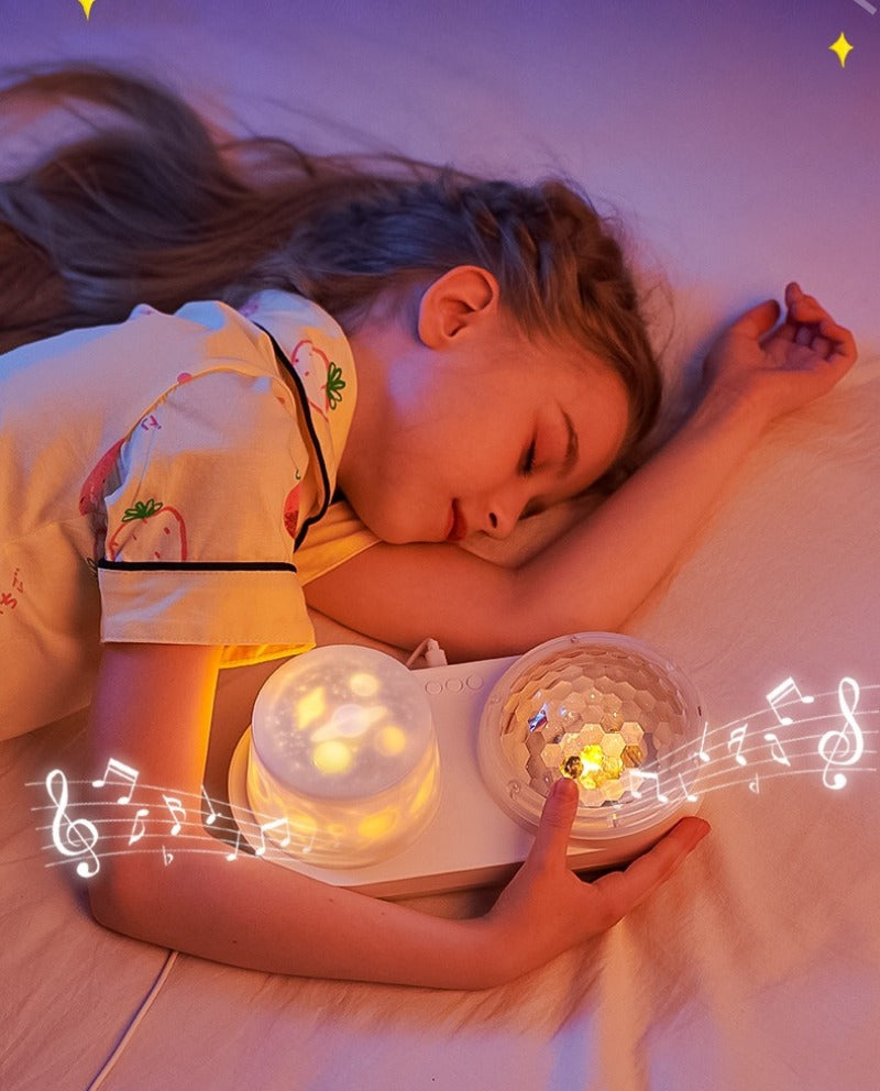A child resting beside a glowing dual-lens night light.