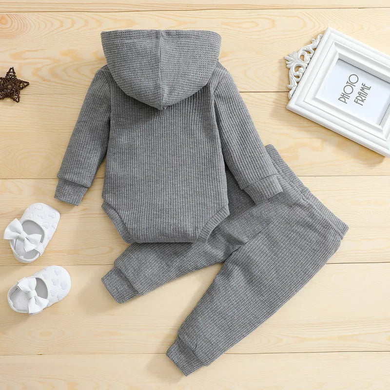 Back of a gray hooded baby bodysuit with matching cuffed pants