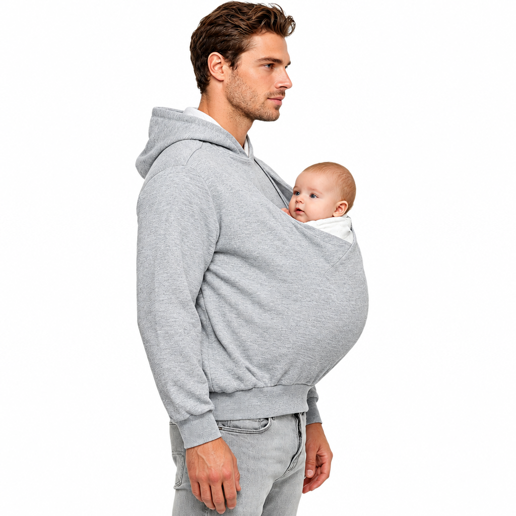 Side view of a man wearing a gray hoodie with a baby in the front pouch