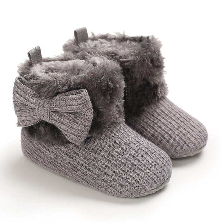 Gray baby winter boots with matching bows and plush ankle cuffs