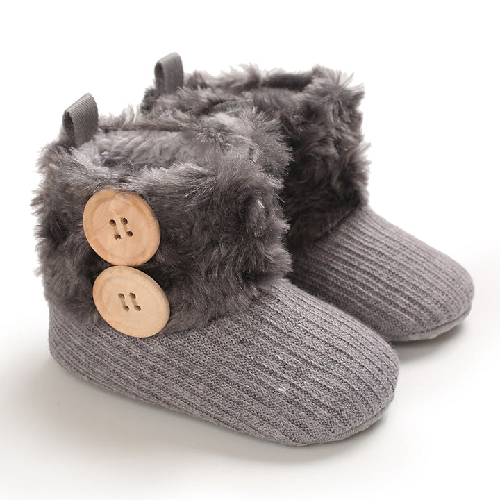 Gray baby boots with plush cuffs and two decorative buttons