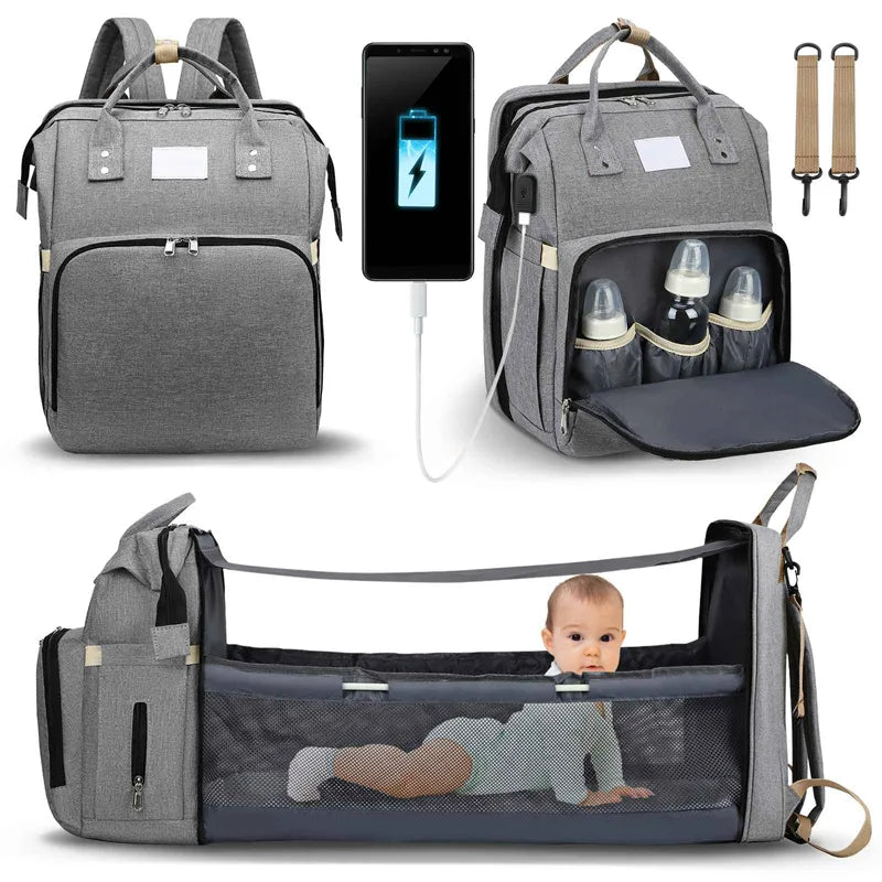 Gray diaper backpack with USB charging connection, bottle pockets and an extended mesh-sided section