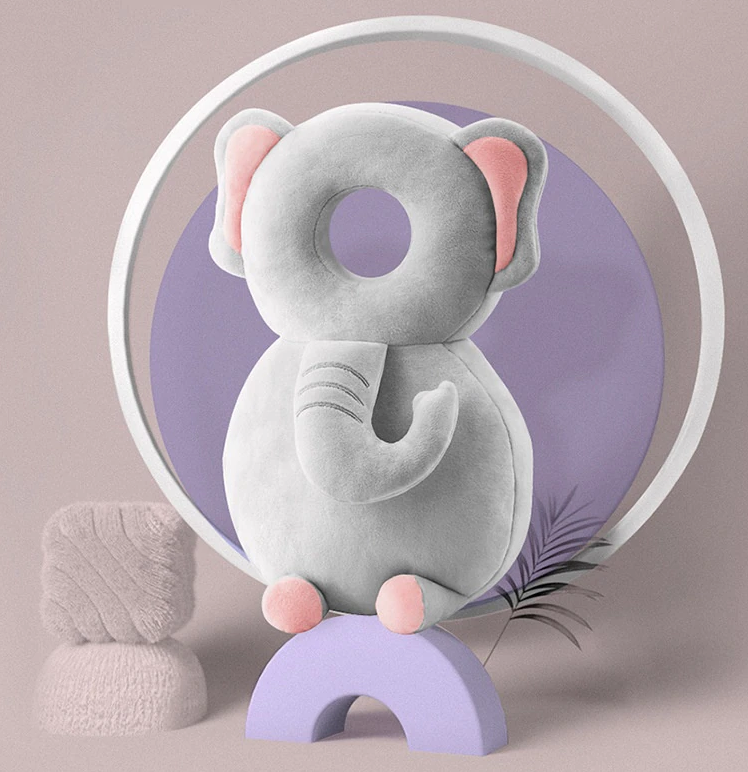 Gray elephant head-and-back cushion with a trunk, pink ears, and a round head opening