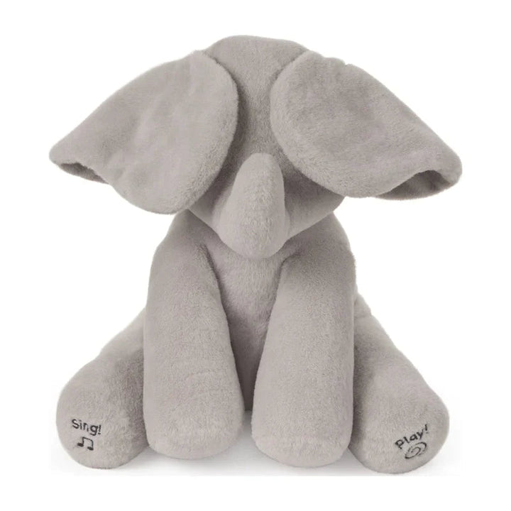 Front view of a gray elephant plush with ears covering its eyes and feet labeled Sing and Play