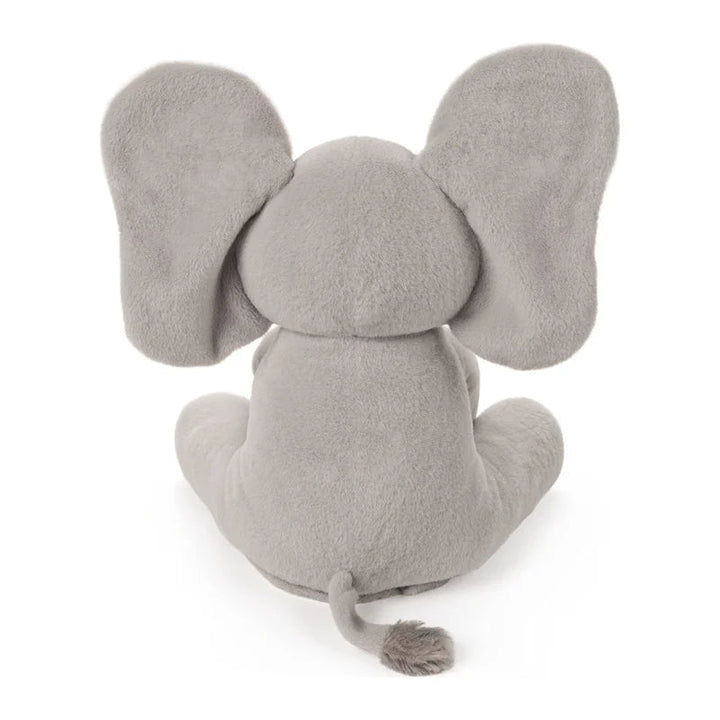 Rear view of a gray elephant plush with wide ears and a tufted tail