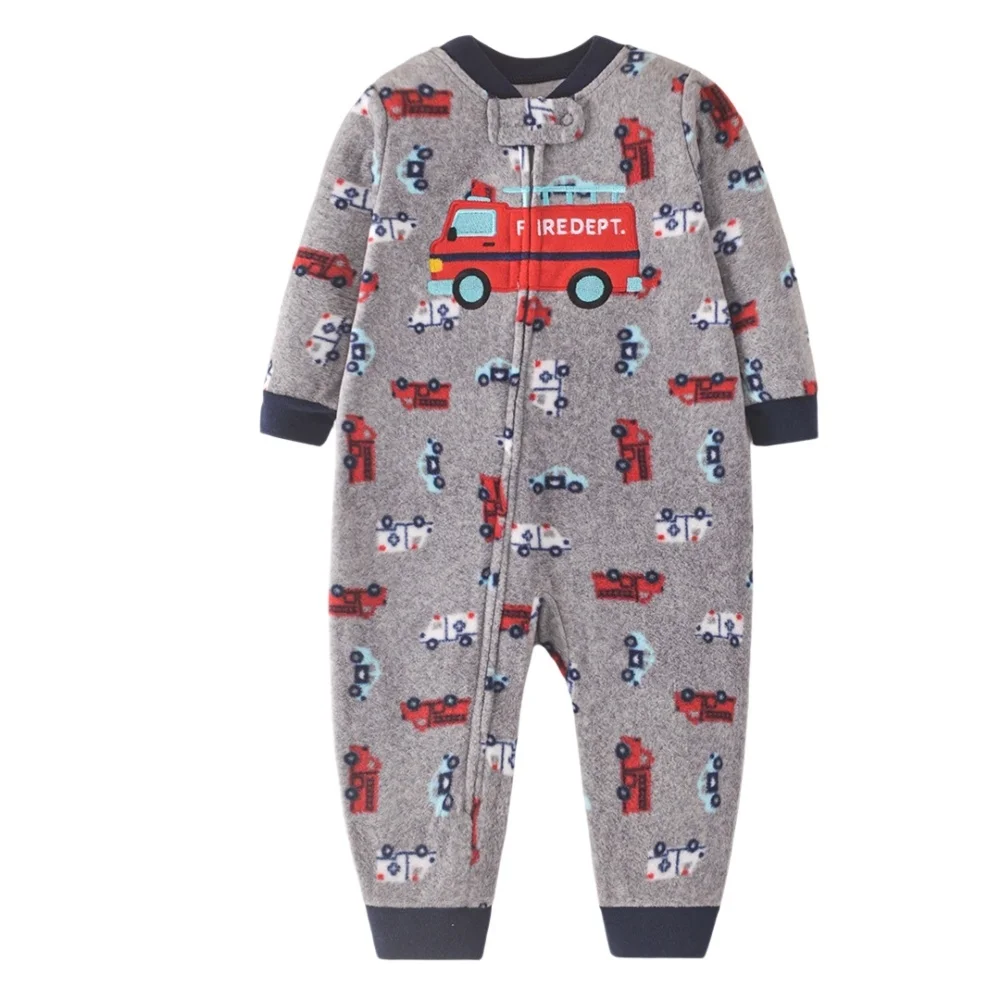 Gray fleece baby jumpsuit with red fire trucks, a large chest truck and dark cuffs