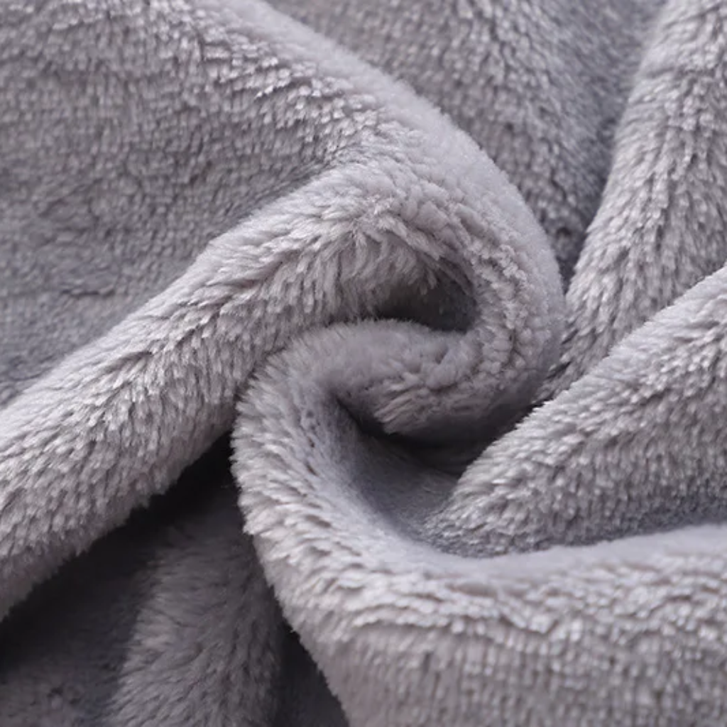 Close-up of gray flannel fabric showing its plush texture