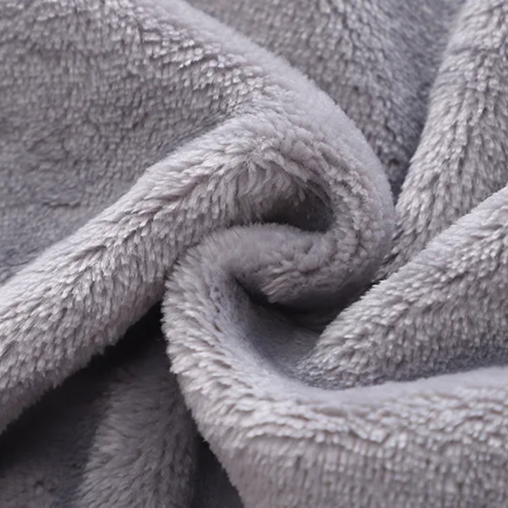 Close-up of gray flannel fabric showing its plush texture
