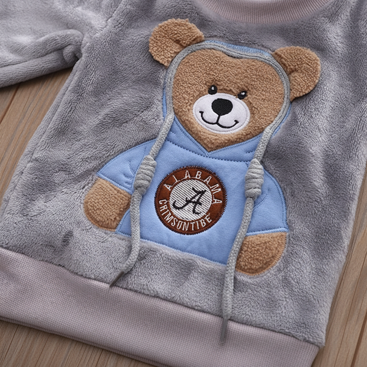 Gray flannel sweatshirt with a textured bear design and ribbed hem