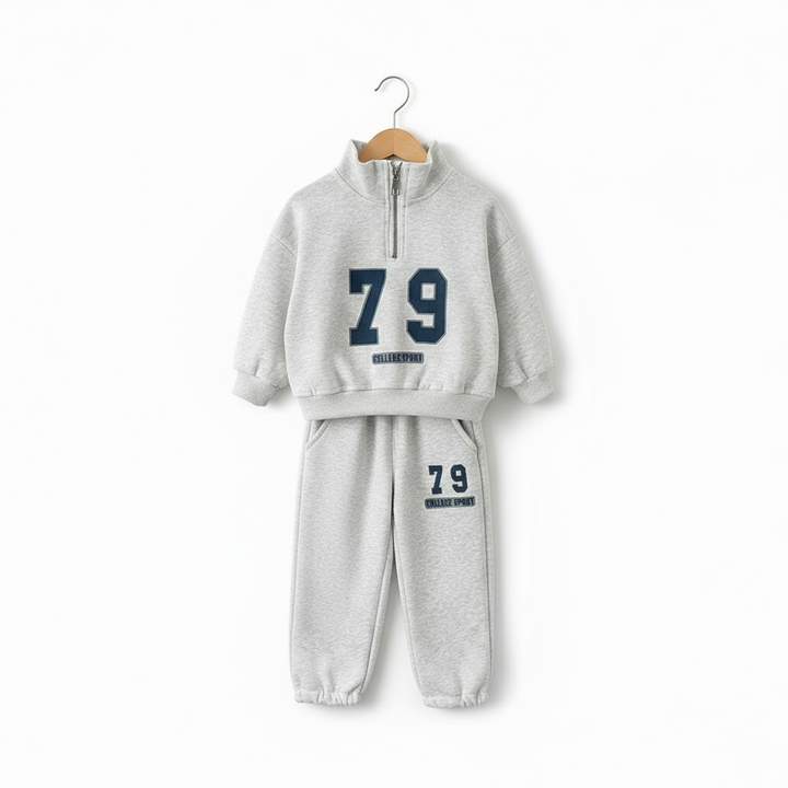 Gray half-zip sweatshirt and matching 79-print joggers displayed on a hanger
