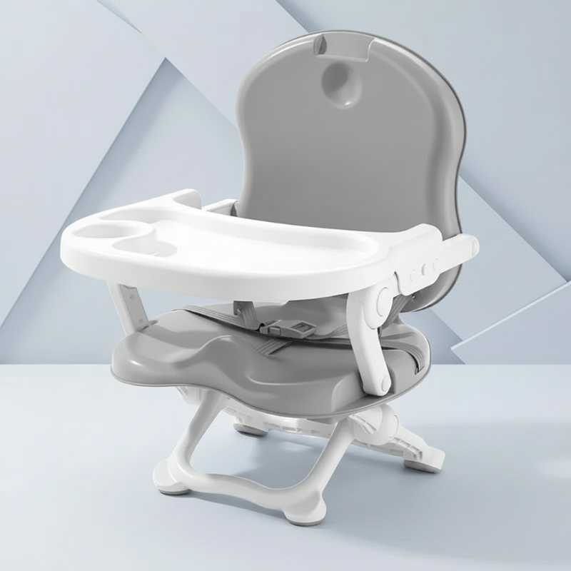 Gray high chair with a white tray, cup holder, and harness