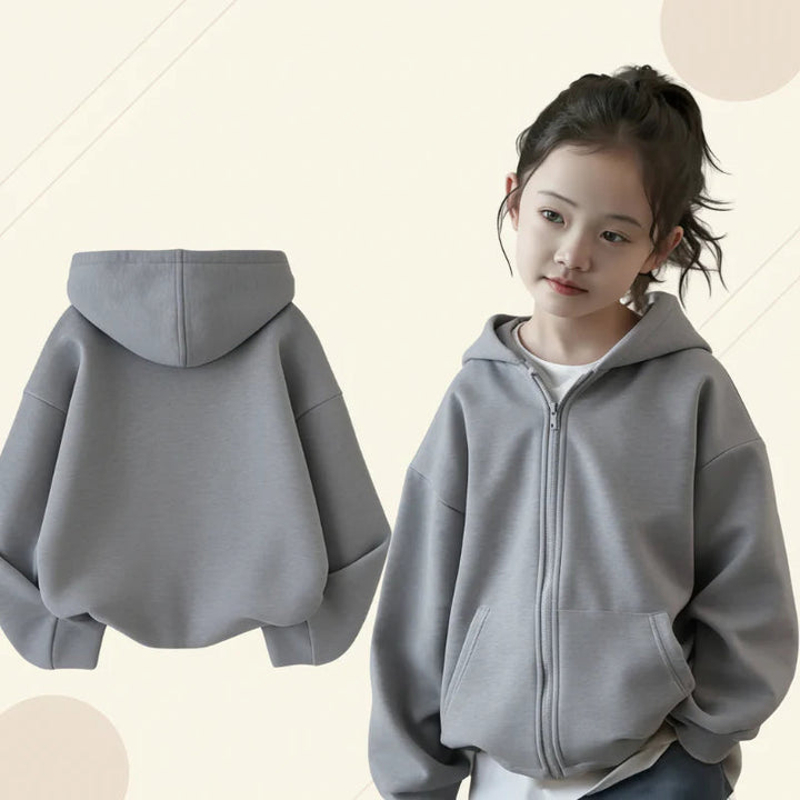 Child modeling a gray zip-up hoodie beside a rear view of the garment.