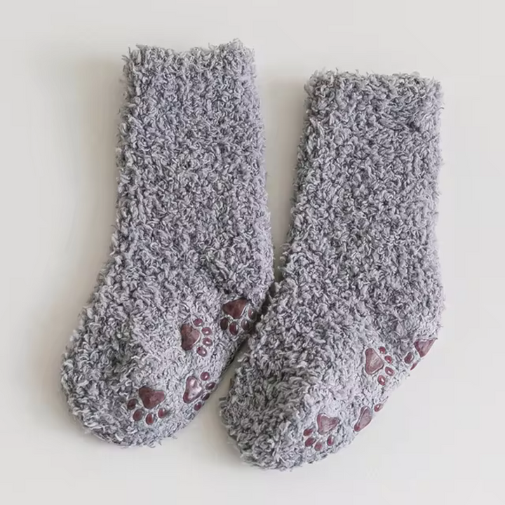 Gray fleece socks with contrasting paw-print sole details
