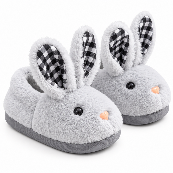 Pair of gray plush bunny slippers with checkered ears and dark gray soles