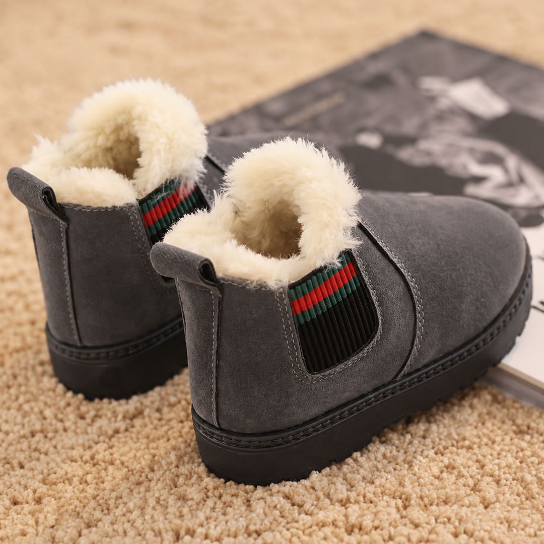 Gray winter boots with cream plush lining, striped elastic side panels, and black rubber soles.