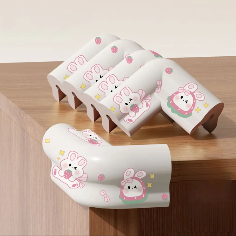 Five gray rabbit-print foam covers, with one wrapped over a wooden cabinet corner.