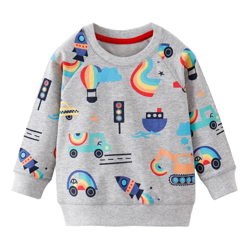 Gray sweatshirt with colorful rockets, rainbows, vehicles, and hot air balloons