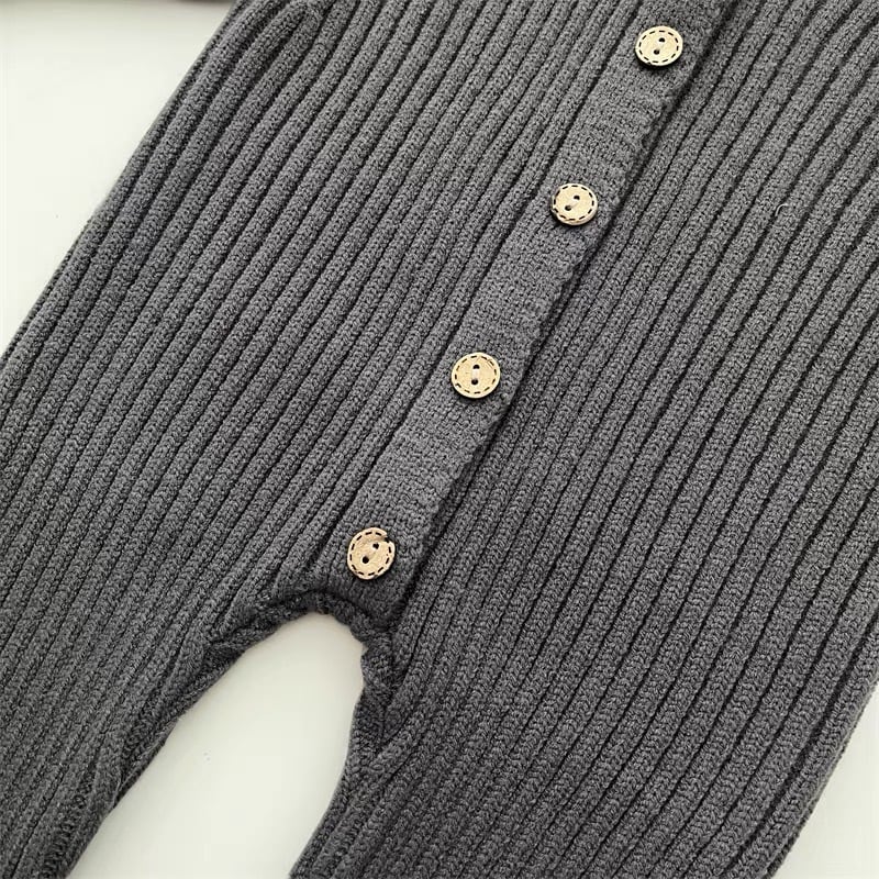 Close-up of gray ribbed knit fabric and the romper&