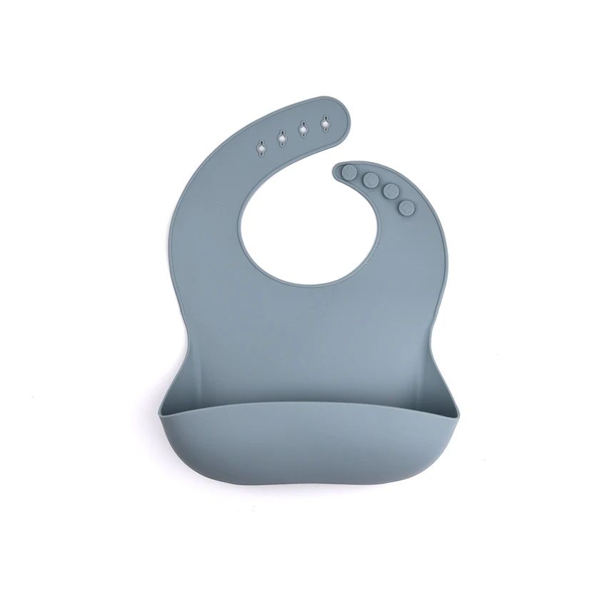 Blue-gray silicone bib with a curved food-catching pocket and adjustable neck snaps.