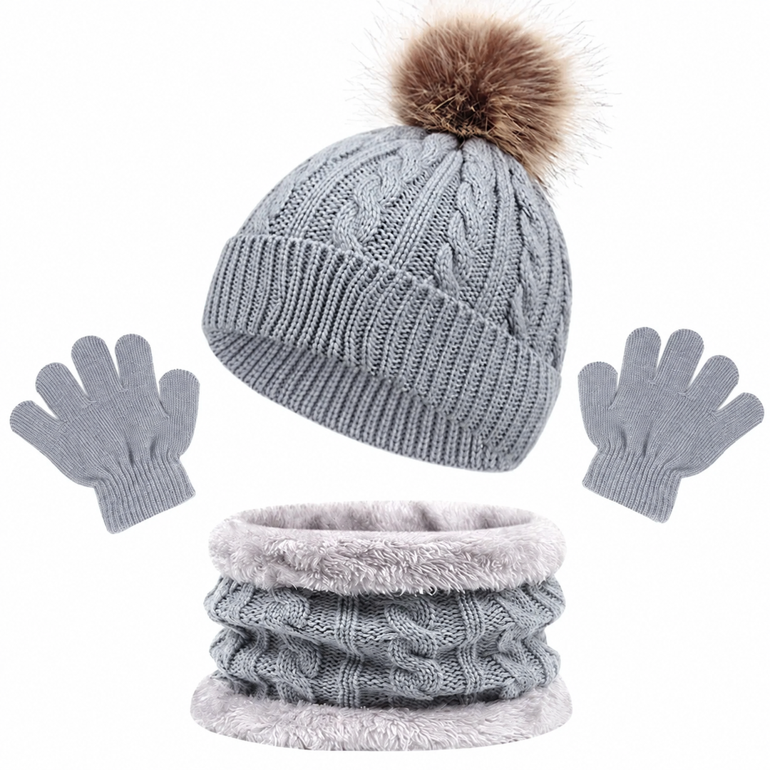 Gray cable-knit winter set with a single-pom-pom hat, loop scarf, and gloves