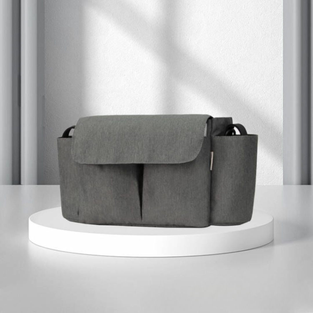 Gray stroller organizer with a front flap and side bottle holders