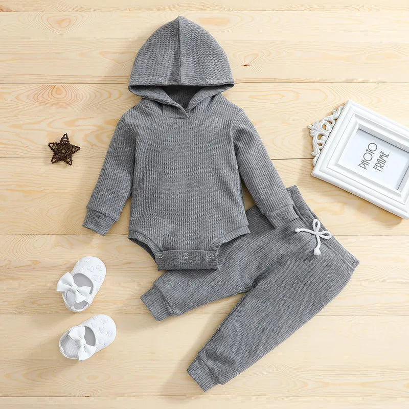 Gray hooded baby bodysuit and matching drawstring pants with textured fabric