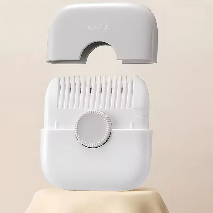 Gray and white hair trimmer with the gray cover removed to show the comb teeth
